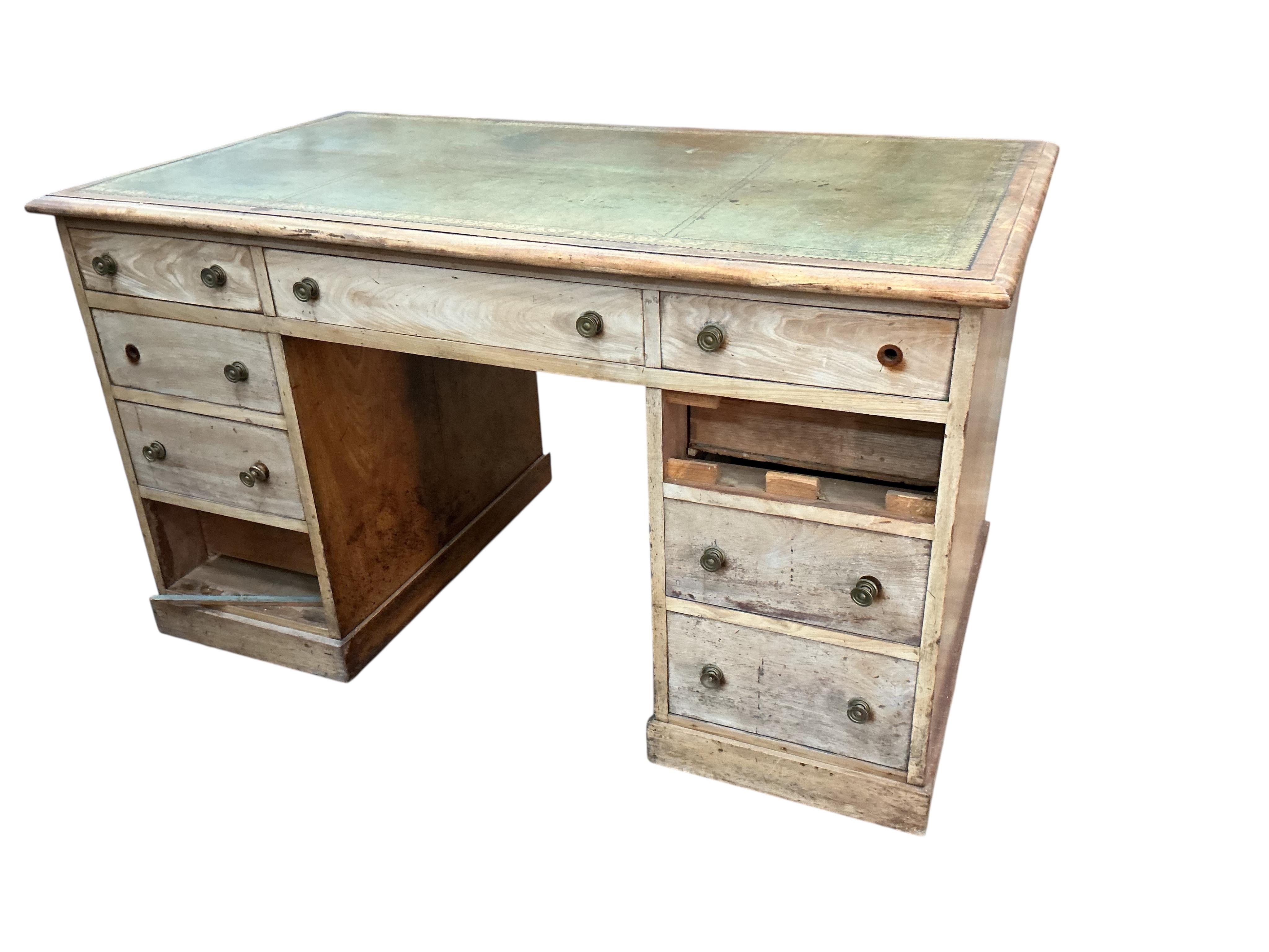 A Victorian faded mahogany kneehole desk with leather inset top, width 127cm, depth 71cm, height 77cm